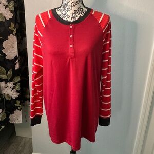 Dark red shirt with lighter red and white stripped sleeves.